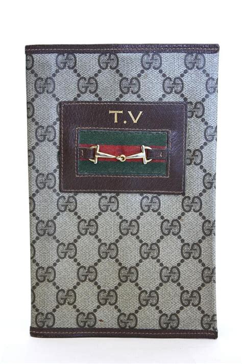 vintage Gucci TV guide cover holder 